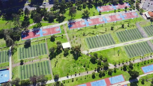 Aerial top down view over many sport fields for soccer and basketball i