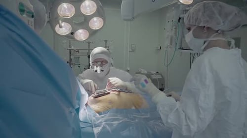 Surgeons Performing Operation in a Sterile Operating Room