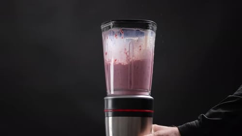 Blending Red Fruit Smoothie in Stainless Blender