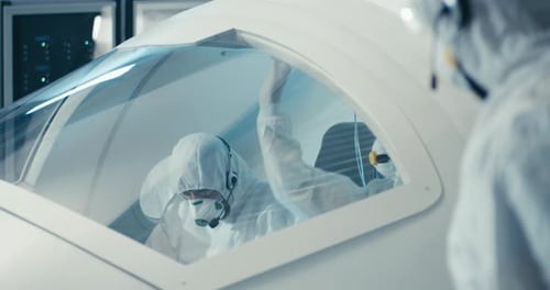 Engineers Working in Clean Room