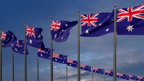 Waving Australian Flags Animated Against Blue Sky