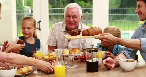 Multi-Generation Family Having Breakfast Together at Home