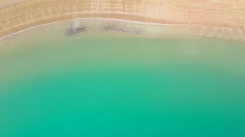 Aerial footage of a beautiful beach shore