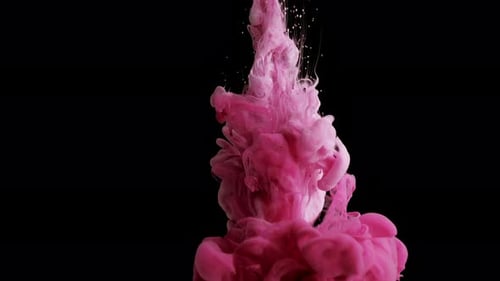 Pink Ink Dropping into Water on Black Background