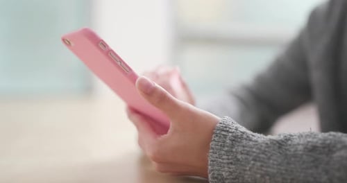 Hands Using Tablet Device Indoors Close Up