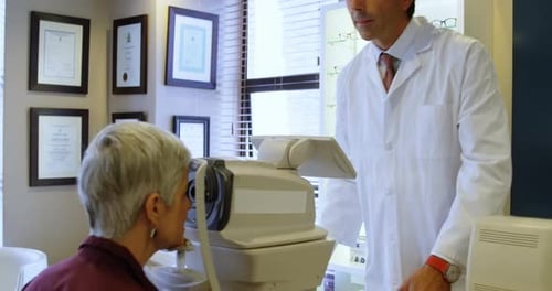 Mature Woman Having Eye Exam By Doctor