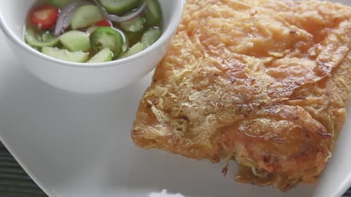 Golden Omelet with Fresh Cucumber and Tomato Side