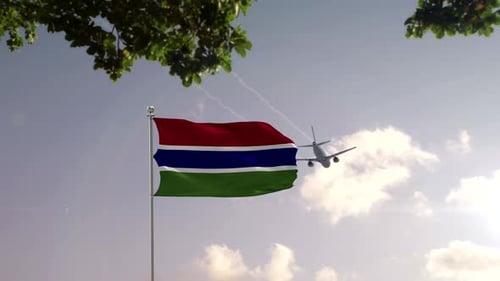 Gambia Flag Waving with Airplane Flying over Modern City