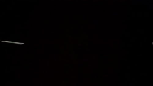 Money Bills and Euros Floating on Black Backdrop