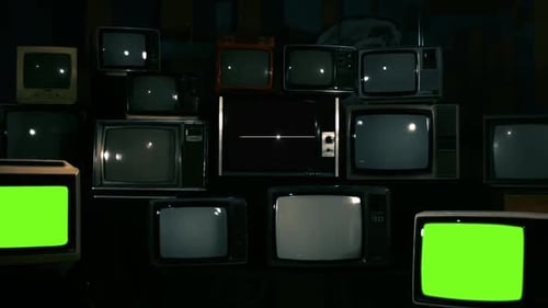 Three Stacked Retro Televisions Turning Off Green Chroma Key Screens.