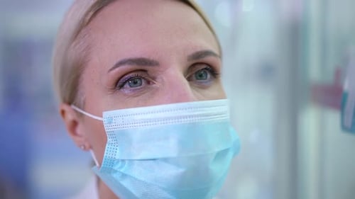 Close Up of Medical Professional Wearing Surgical Mask