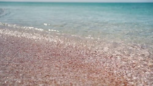 Beach and Clear Turquoise Sea on Sunny Day