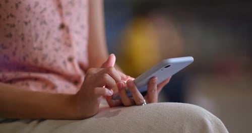 Woman's Hands Using Smartphone Close Up