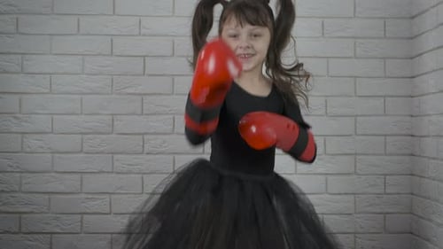 Happy Child in Sport Gloves
