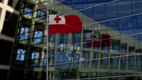 Realistic Tonga Flag Waving on Modern Building Background