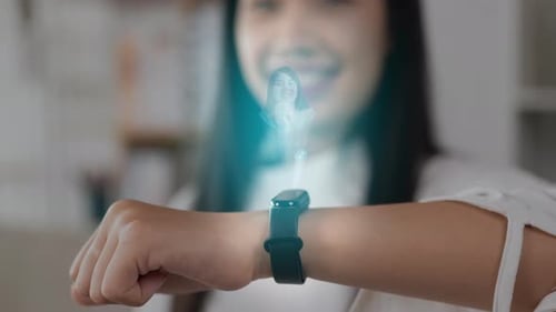 Close up hand of woman pressing buttons on smart watch and chatting on video call