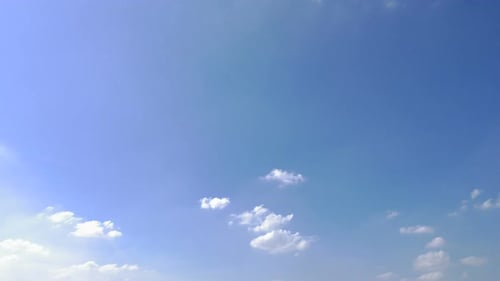 Time lapse of white cloud moving pass around sky background