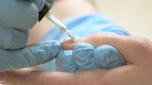 Woman Receiving Manicure Close Up