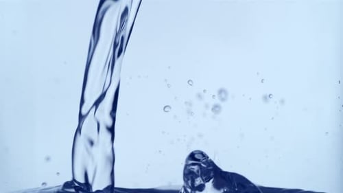Pouring Water Creates Bubbles and Ripples