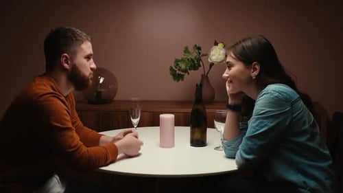Couple Sharing Intimate Dinner Date at Home