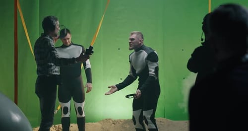 Actors Film Sci-Fi Scene on Green Screen Stage