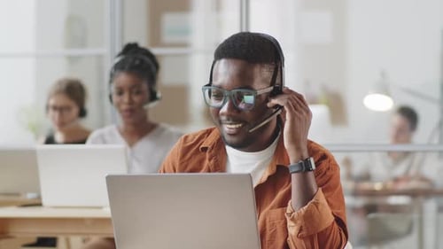 Positive Afro-American Man Working in Call Center