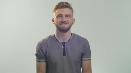 Man Smiling Holding Tablet with Green Screen