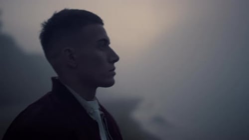 Stressed Guy Standing on Sea Beach at Sunrise