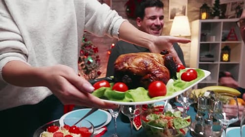 Christmas Dinner with Roasted Turkey and Gathered Friends