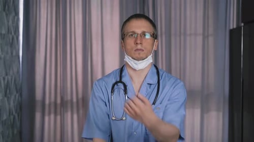 Healthcare Worker Takes Mask Down Indoors
