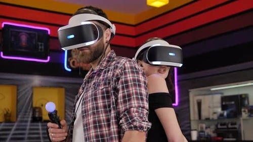 Man and Woman Experiencing Virtual Reality
