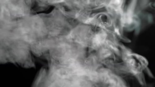 Wispy White Smoke on Black Background