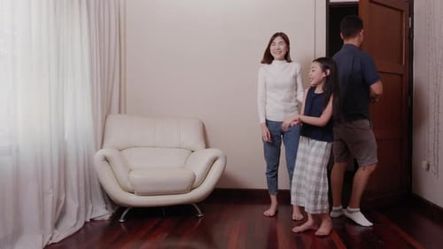 Family Bonding Together in Their House Interior