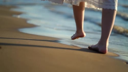 Barefoot Beach Walk on a Sunny Day