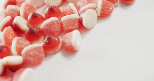 Close up view of halloween candy corn fallen against grey background