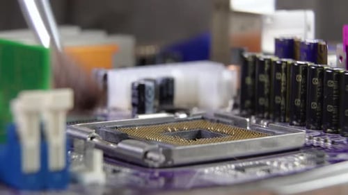The Process of Cleaning and Installing a Processor on a Computer Motherboard