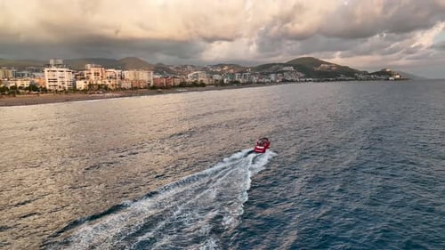 Sports boat sails fast on the sea aerial view 4 K
