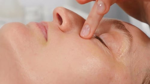 Beautician Doing Cure Procedures on Client Face in Cosmetology Clinic