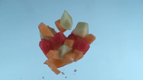 Morceaux de melon volant au Ralenti, filmés avec Phantom Flex 4K à 1000 images par seconde