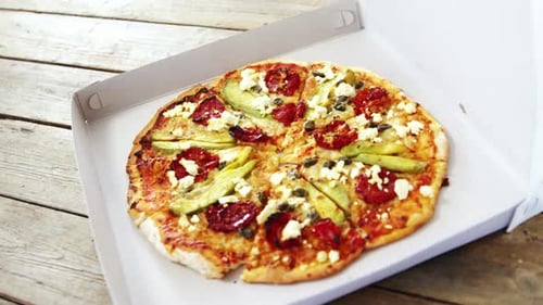 Delicious pizza in pizza box