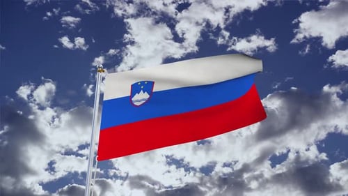 Slovenian Flag Waving In Blue Sky