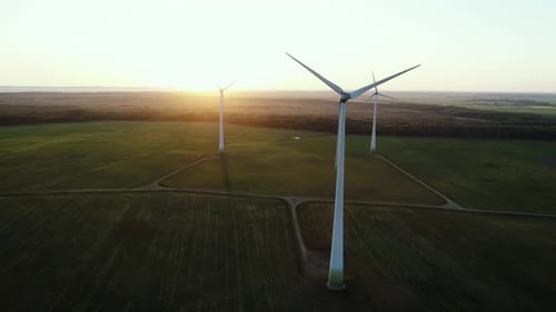 Windmills Power Plant during Sunset
