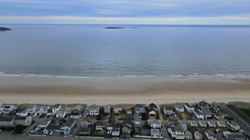 Aerial View of Beautiful Urban Landscape Small Coastal Town Ocean Landscape on Water in Summer Day