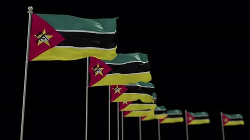 Mozambique Flags Waving on Poles Against Black Background