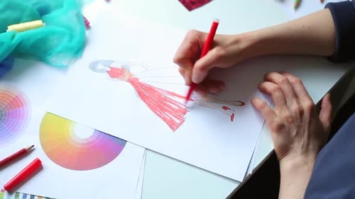 Fashion Designer Drawing Dress Design