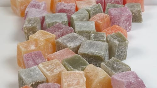 Colorful Turkish Delight Candies on a White Surface