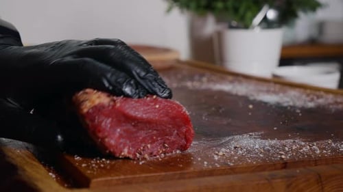 Raw Meat Seasoning Preparation on Cutting Board