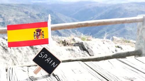 Spanish Flag and Mountains Travel Destination