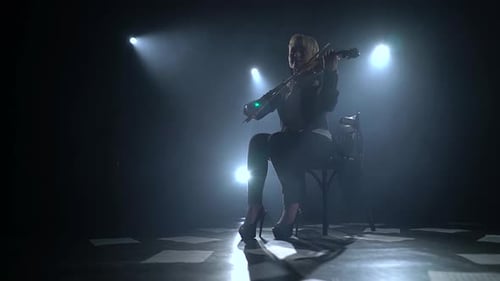 Violinist Playing in Dark, Smoky Stage Environment