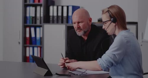 Coworkers Discussing in Online Meeting at Office
